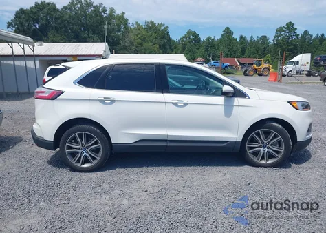 2022 Ford Edge Titanium z USA, uszkodzony, nr VIN 2FMPK4K90NBA13263